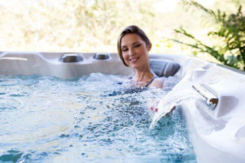 women having bath inside the hot tub