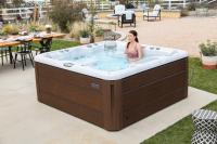 women having bath inside the hot tub