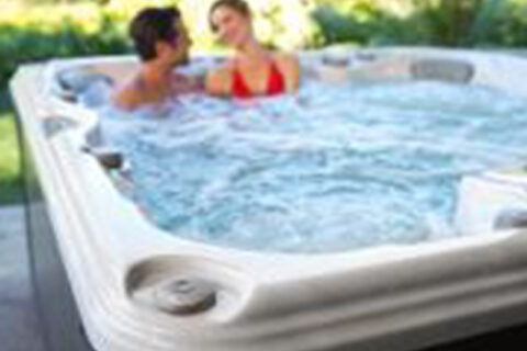 couple enjoying in hot water tub